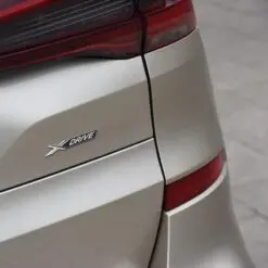 BMW X-drive Logga baklucka krom