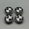 BMW navkåpor 68mm i svart/vit – 4-pack centrumkåpor med elegant finish
