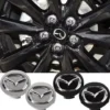 Mazda navkåpor 57 mm – svart och grått 4-pack centrumkåpor med klassisk design