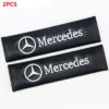 Mercedes bälteskuddar i svart kolfiberlook – 2-pack för ökad komfort och sportigare känsla i bilen.