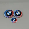 BMW-Emblem-50-årsjubileum-3pack-motorhuv-emblem-rattemblem-bagageemblem
