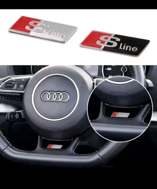 Audi S line ratt emblem i svart och krom – sportig detalj för interiören