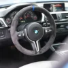 BMW F-serie rattöverdrag i svart mocka med perfekt passform och hög komfort