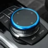 Blå BMW iDrive-ring i aluminium – lyfter interiören med en sportig och elegant touch.