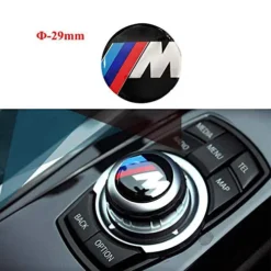 Ge din BMW en sportig touch med M-emblem till iDrive-vredet – perfekt passform, 29 mm i diameter.