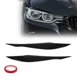 Blanksvarta ögonlock monterade på strålkastare på BMW 3‑serie F30/F31 som ger bilen ett skarpare och mer aggressivt uttryck framtill.