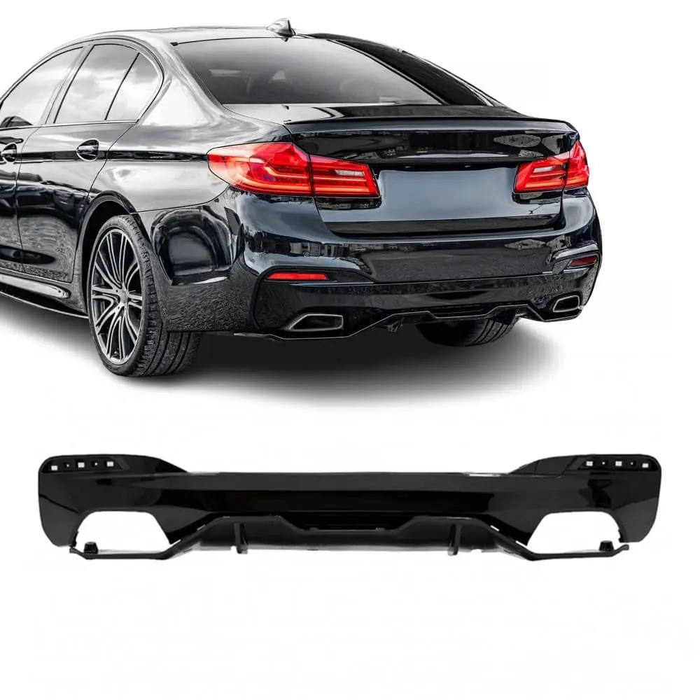 Blanksvart M-Performance diffuser för BMW G30/G31 som ger bilen en aggressiv bakdel och förbättrar det sportiga helhetsintrycket.