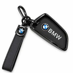 BMW G-serie nyckelskal i glansig metall och läder – exklusivt skydd med premiumdesign och perfekt passform för BMW-nycklar.